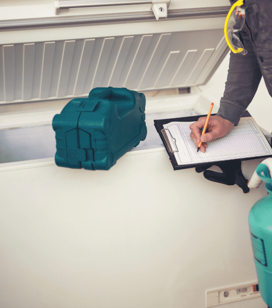 Technician repairing a freezer in Durango, CO